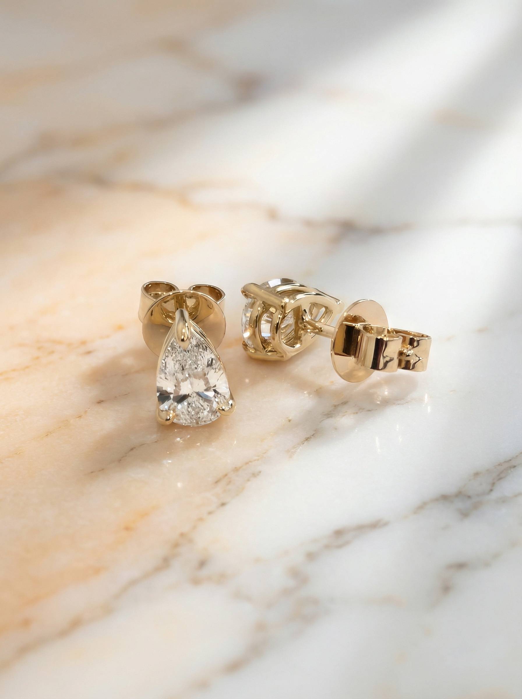 18ct yellow gold pear cut diamond stud earrings pair